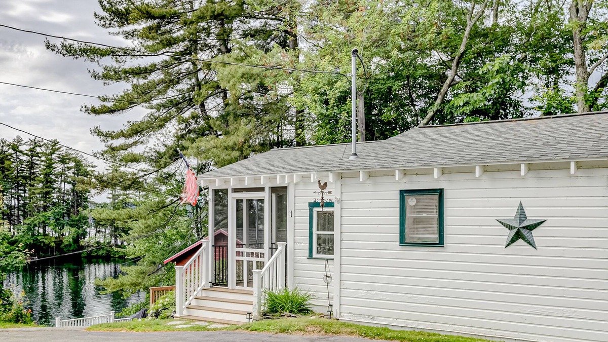 Winnisquam Cottage | Lakefront cottage with WiFi, full kitchen, dock, deck & game room