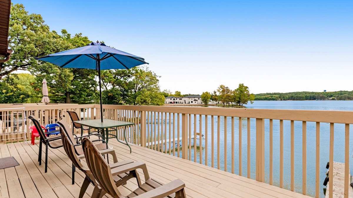 Lake Delton Condo | Lakefront dog-friendly condo near skiing with private beach access, views & dock
