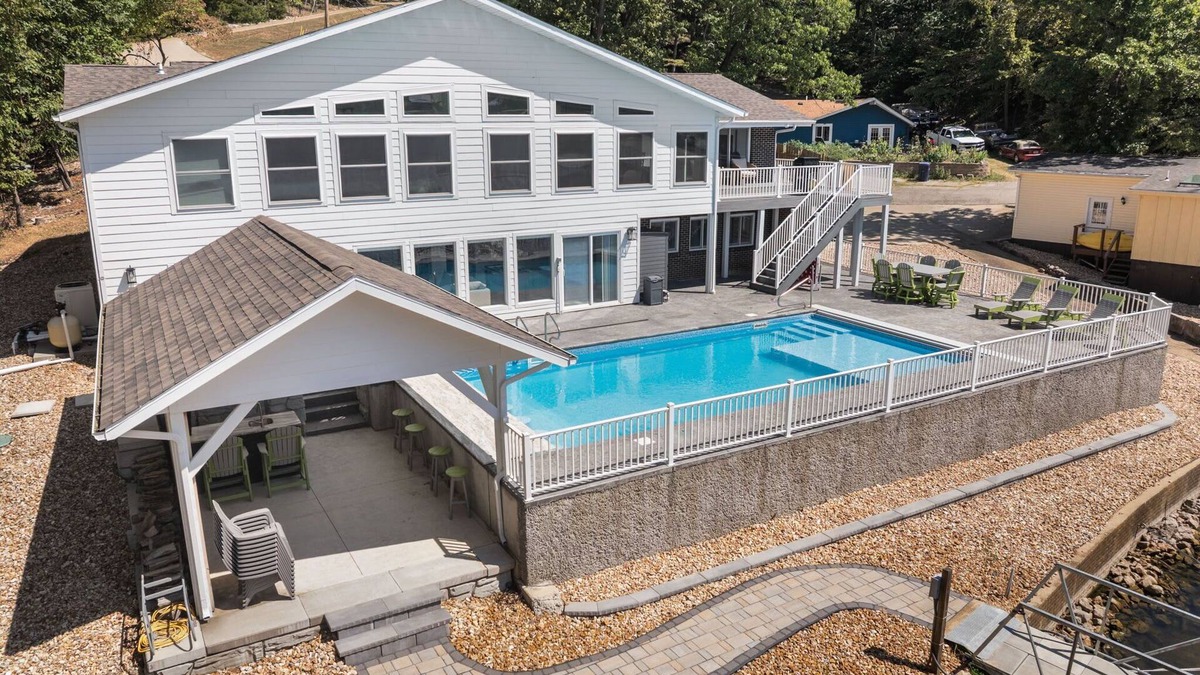 Sunrise Beach House | Lakefront Home Salt Water Pool & Private Dock