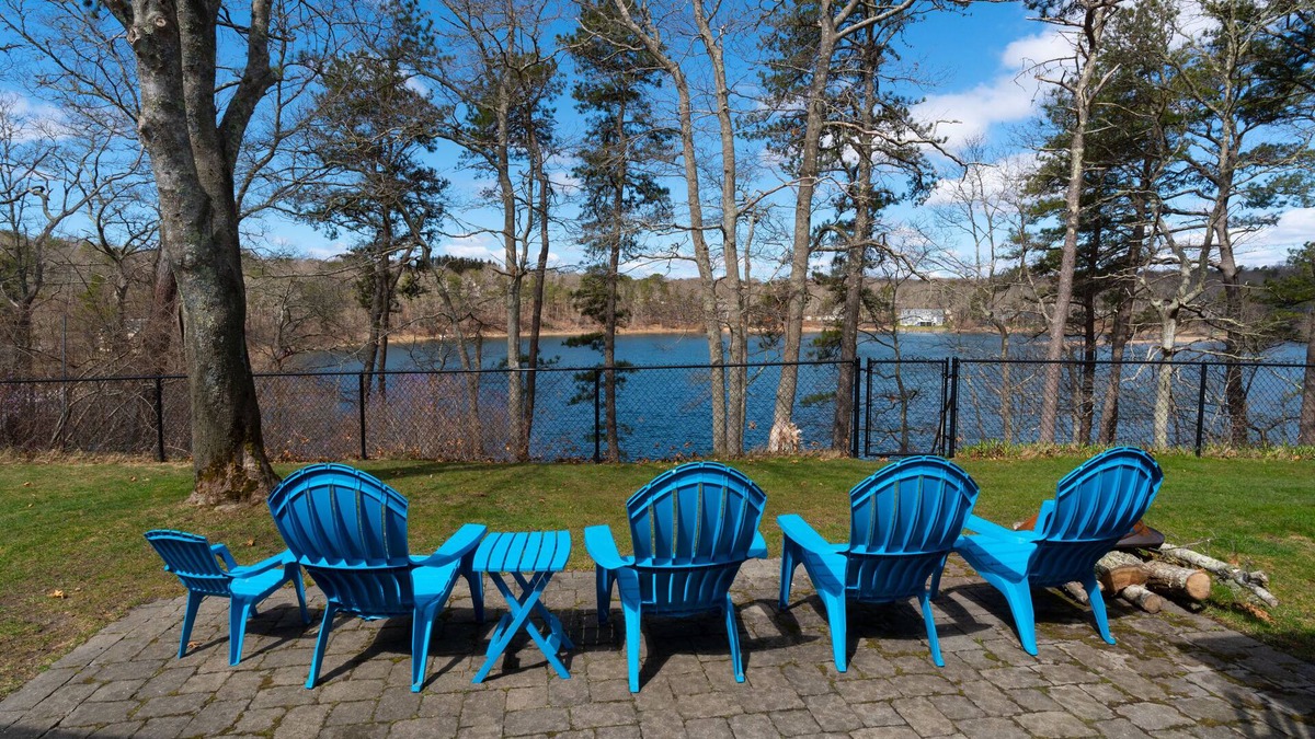Forestdale House | Lakefront Home with Porch, Patio and Fenced Yard - Short Drive to Beach