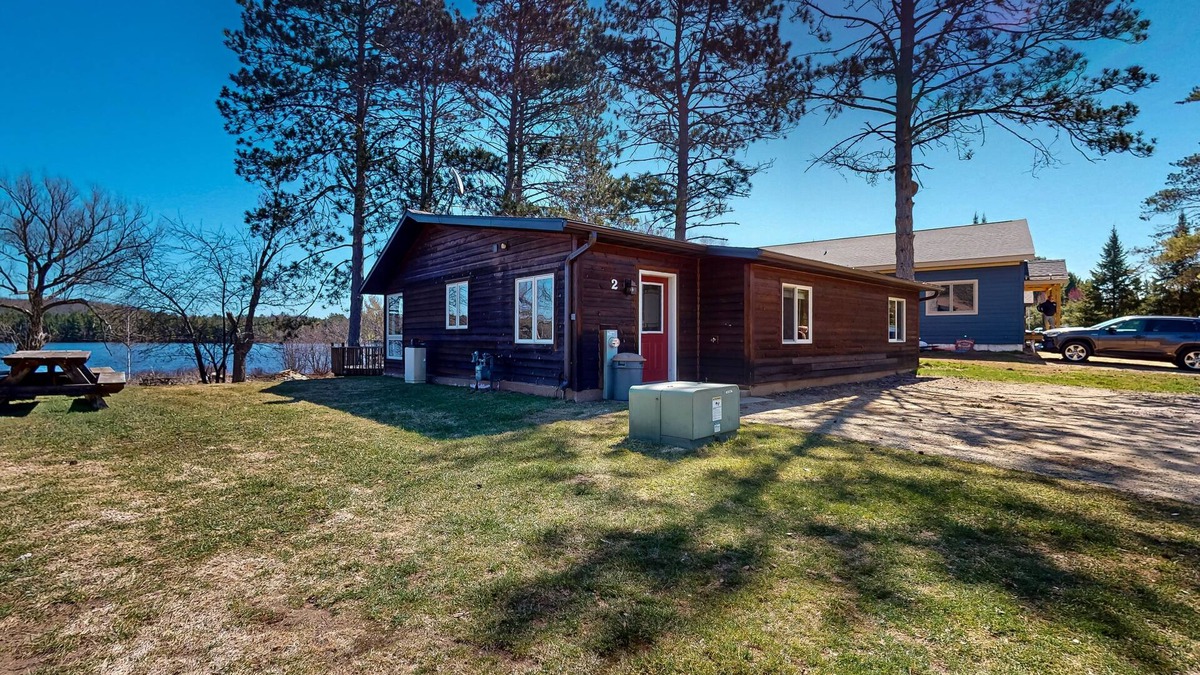 Three Lakes House | Lakefront home with amazing views, WFH desk, canoe, kayaks & private dock