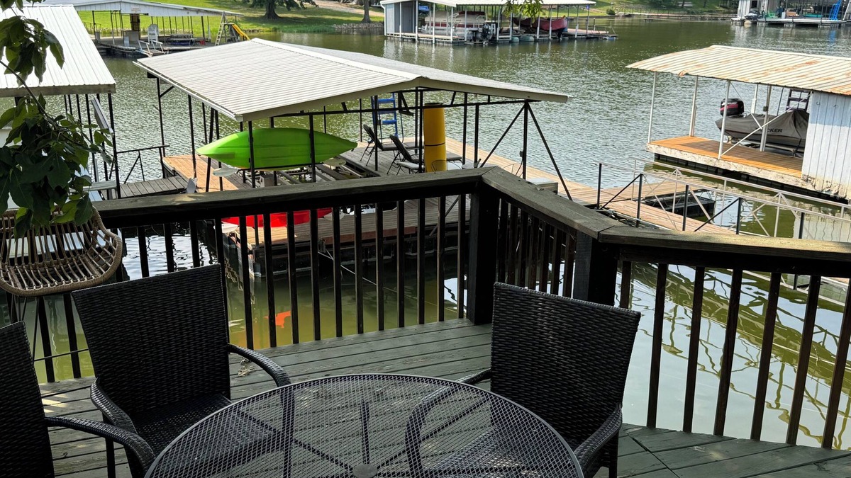 Gravois Mills House | Lakefront house with large deck, private boat dock, and covered outdoor games!