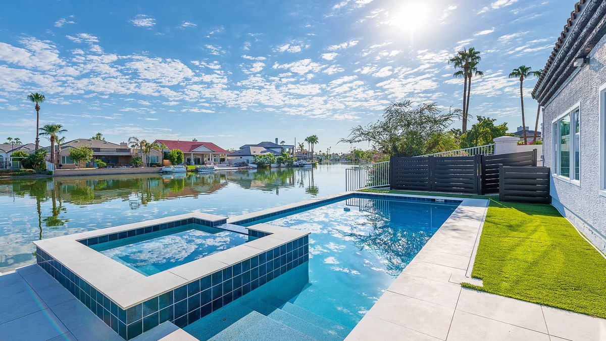Val Vista Lakes House | Lakefront Lux by HomeSlice Stays