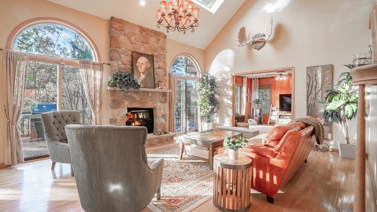 East Stroudsburg House | Lakefront Mansion w/3 Decks, Hot Tub, Boats, & Game Room!