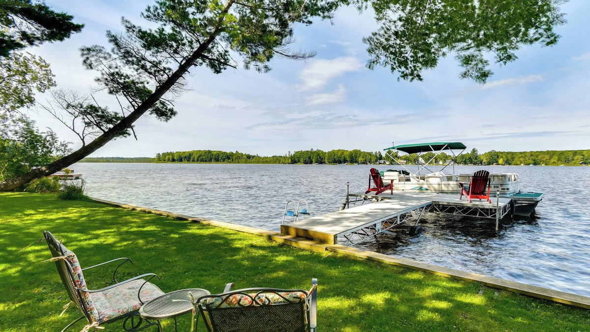 Kalkaska House | Lakefront Retreat w/Pedal Boat & Dock in Kalkaska