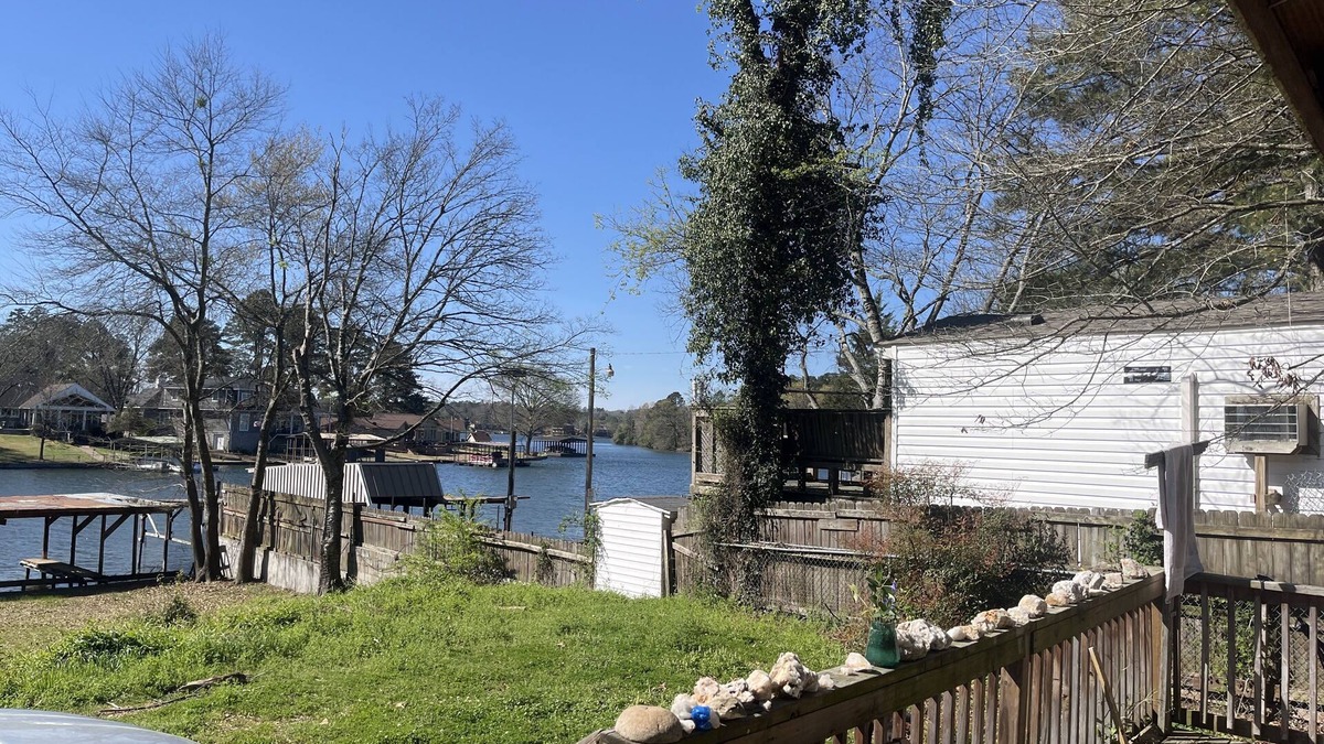 Lakeland RV Rental | lakefront spot for tent/small rv w/access to shared bathroom pet friendly