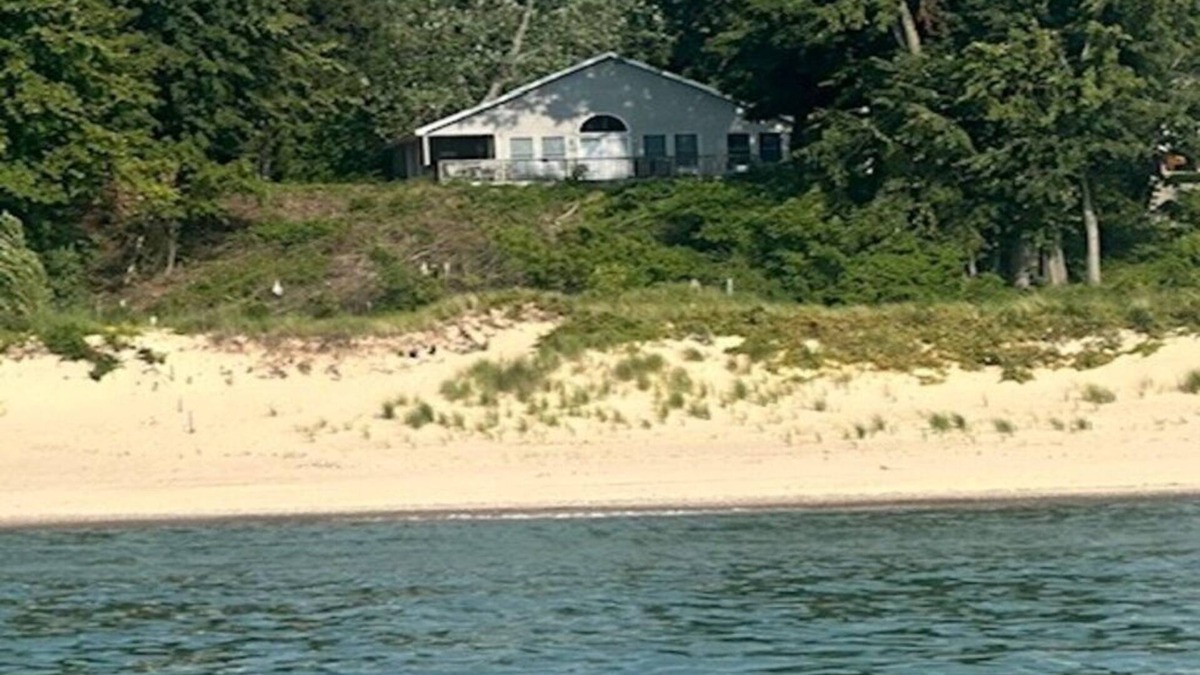 South Haven Cottage | Lakefront two-bedroom cottage with private beach & breathtaking views of Lake MI