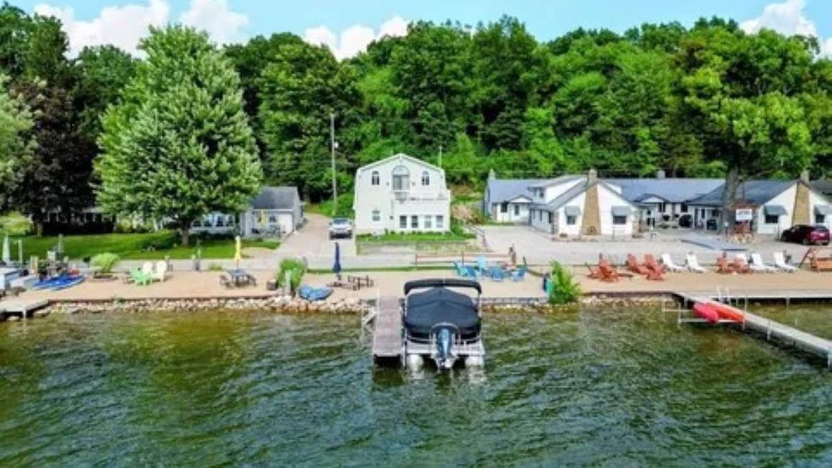 Sand Creek House | Lakeside Beach Getaway with A Gorgeous Kitchen & Dining Room with Room for 10.