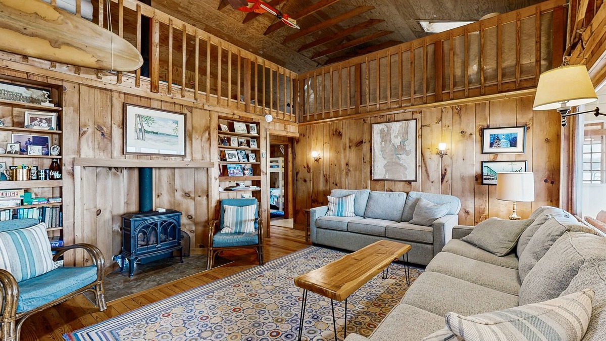 Malletts Bay House | Lakeside cottage w/mountain views, canoes, firepit, enclosed porch, bbq, beach