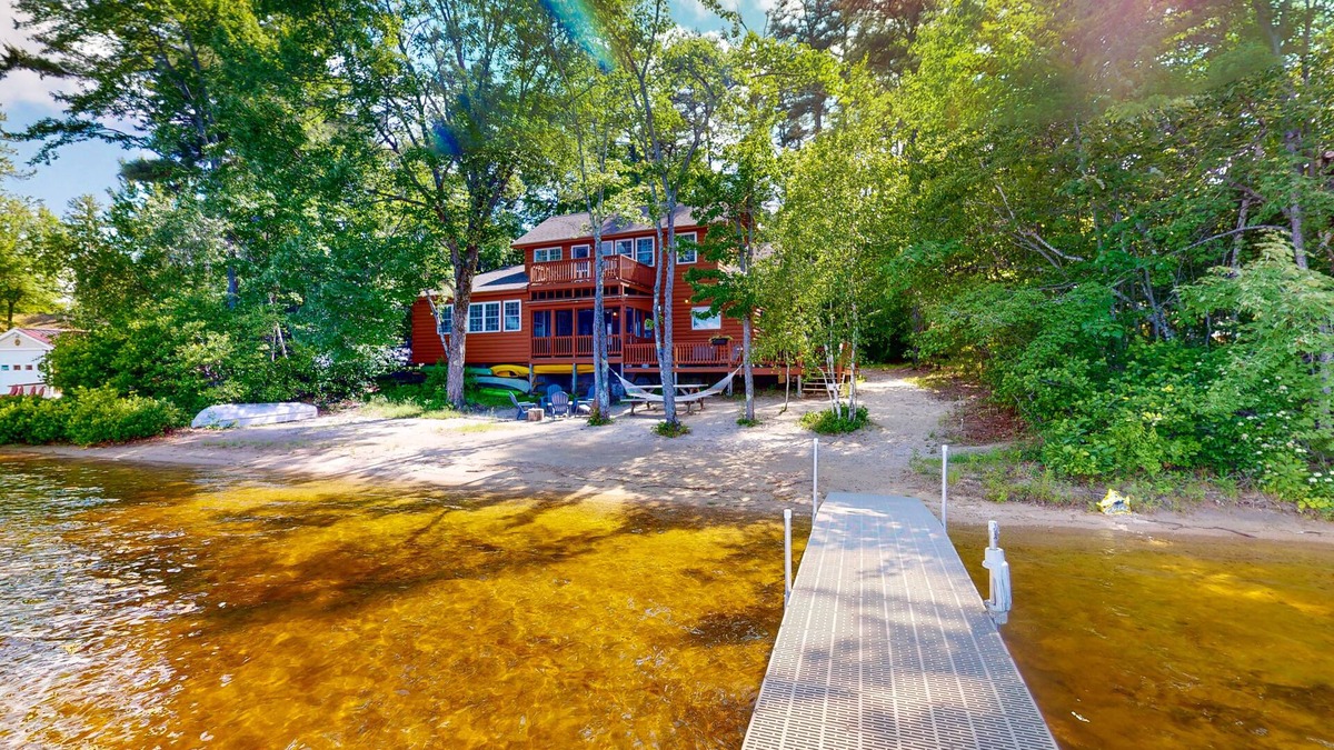 The Bays Cabin | Lakeside home with private dock, firepit, grill, scenic balcony, fireplace & AC