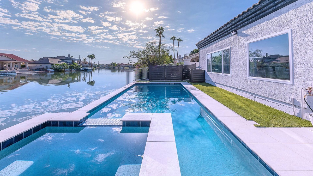 Val Vista Lakes House | Lakeside Luxe: Private Home in Gated Community with Heated Pool, Spa and More!