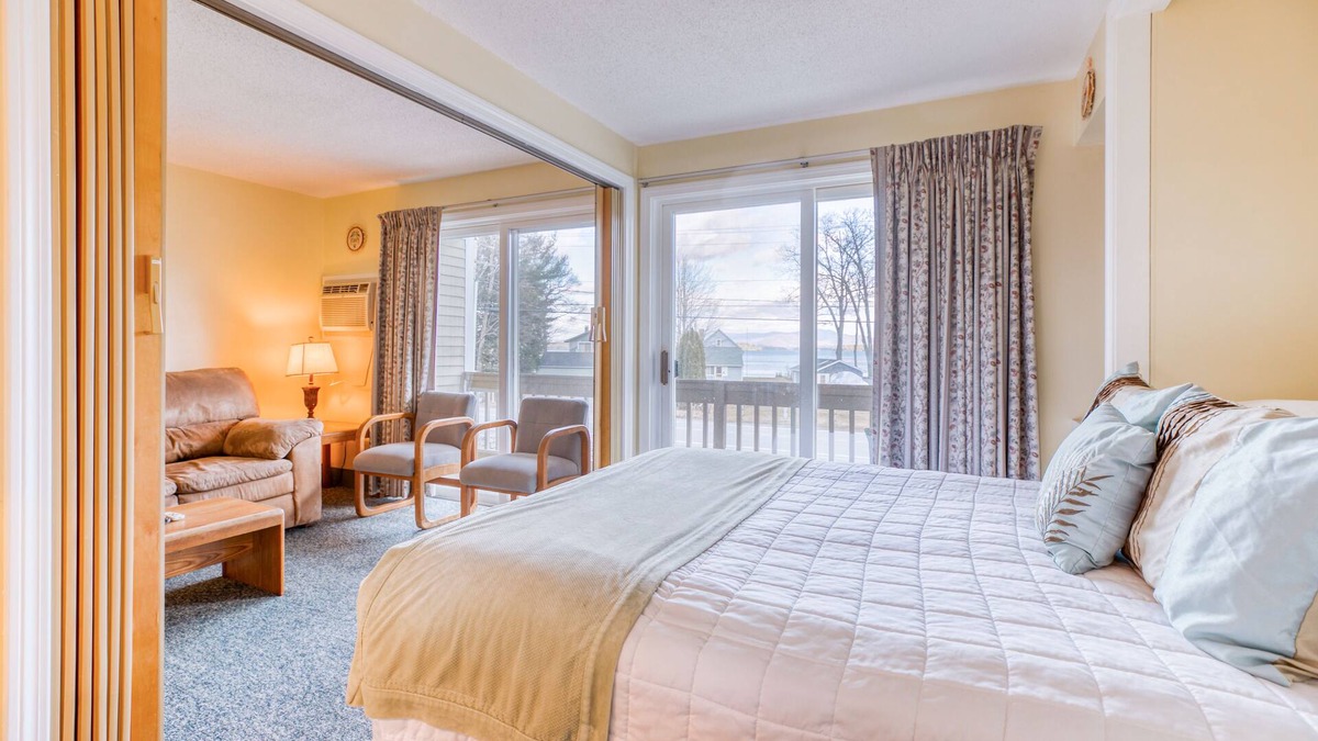 Gilford Condo | Lakeview condo with tennis, sauna, shared pool & a private beach