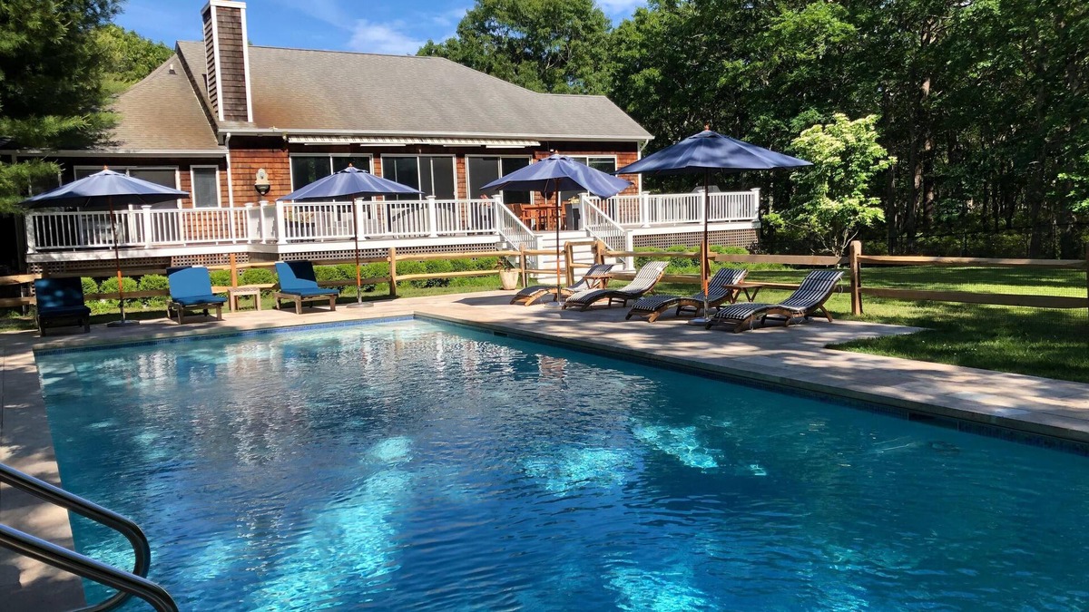 Hampton Bays House | Large 5 bedroom/5 bath secluded property with large heated pool on over an acre