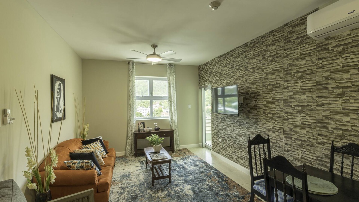 New Kingston Condo | "Le Luxe" Penthouse 2 BR condo w/AC, WiFi, complimentary Netflix & 24/7 sec