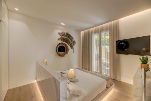 Poetto House | Le Palmette Suites