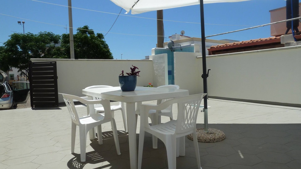 Lido Marini Apartment | LIDO MARINI - LOVELY VACATION HOME WITH LARGE EQUIPPED OUTDOOR COURTYARD