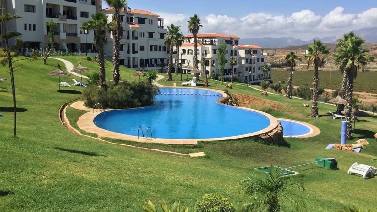 Cabo Negro Apartment | Lilac's garden Vue piscine