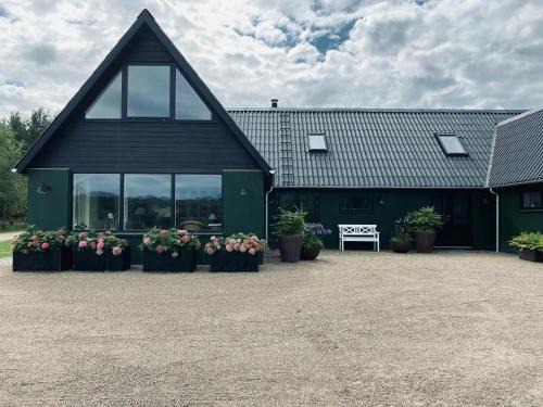 Hadsten House | Lodge With Private Lake Near Bidstrup Forest