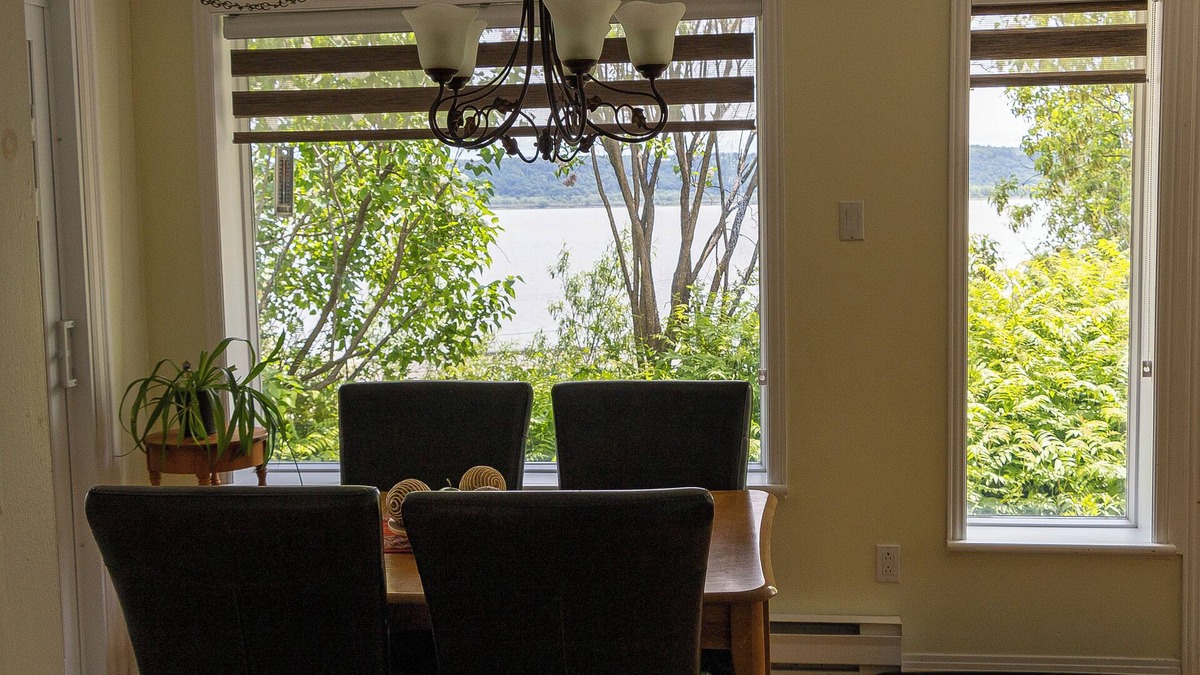 Chateau-Richer Apartment | Lodging Petit Séjour water view. Families and pets welcome!