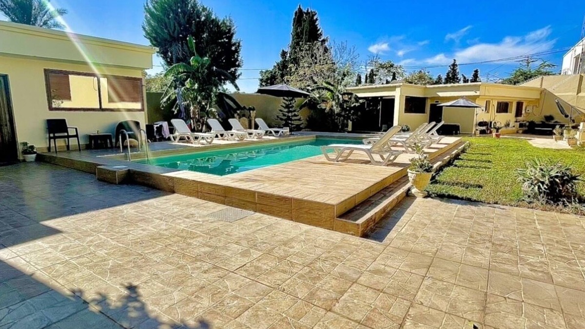 La Fayette Apartment | Lodging with panoramic views on the edge of a lawn garden and swimming pool