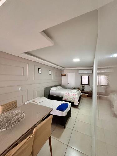 Jardim Karaiba House | Loft 03 - Zona Sul Prox UMC, Pátio Vinhedos e Shopping
