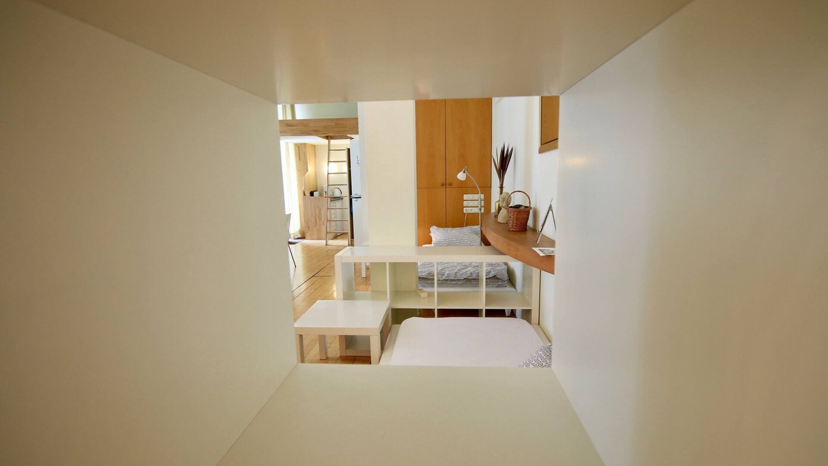 Oberhausen Apartment | Loft with parquet and designer lights by Ingo Maurer - attractive and stylish