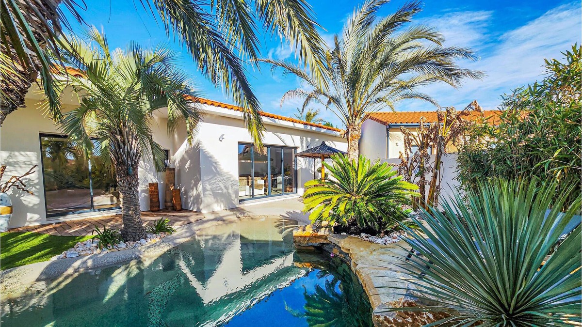 Roujan House | Look forward to an unforgettable vacation in this modern vacation home with pool.