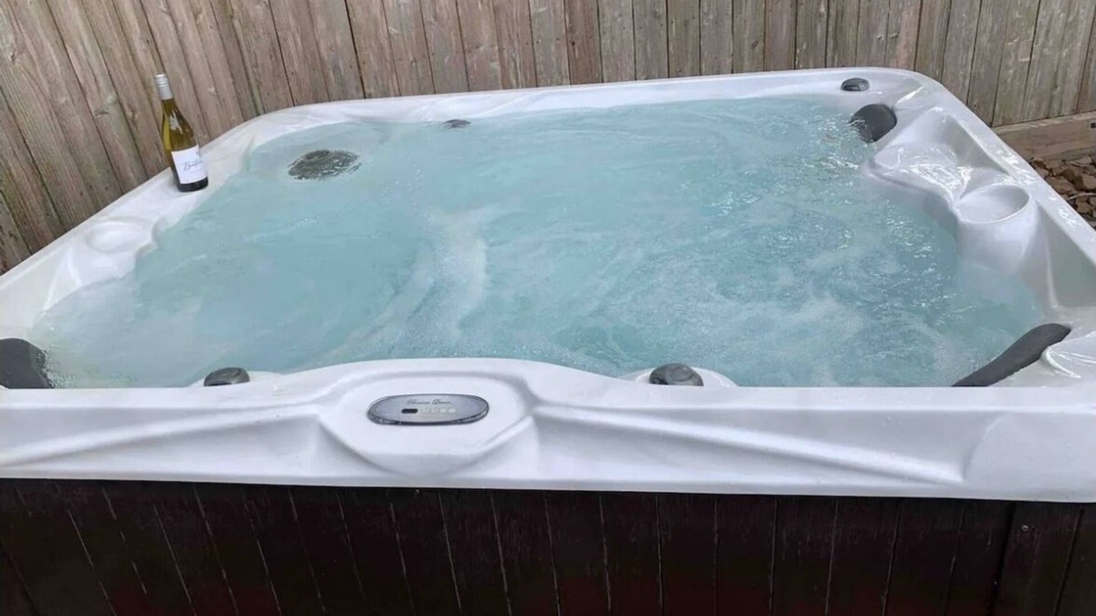 April Sound House | Lookout Lake Conroe April Sound Private Backyard with hot tub