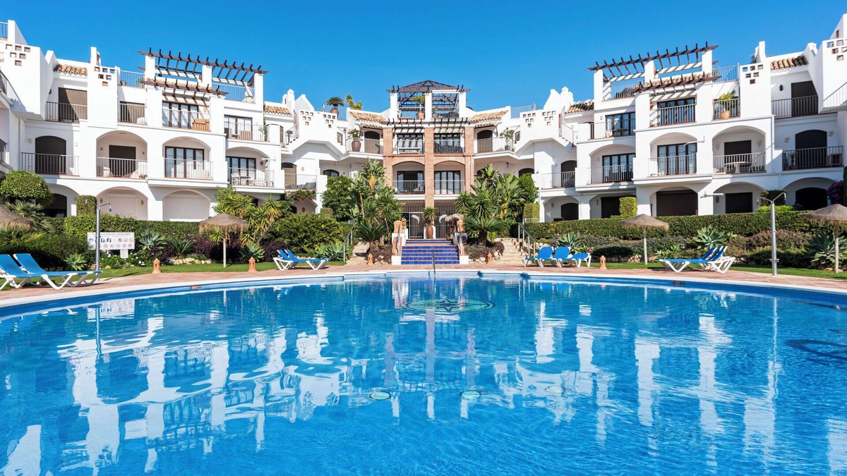 Benahavis Apartment | Los Arqueros sunny balcony with pool by Costarentals - Ref M52