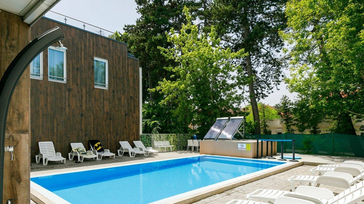 Balatonlelle Apartment | Lovely apartment for 8 people with A/C, internet, pool, TV, balcony and parking