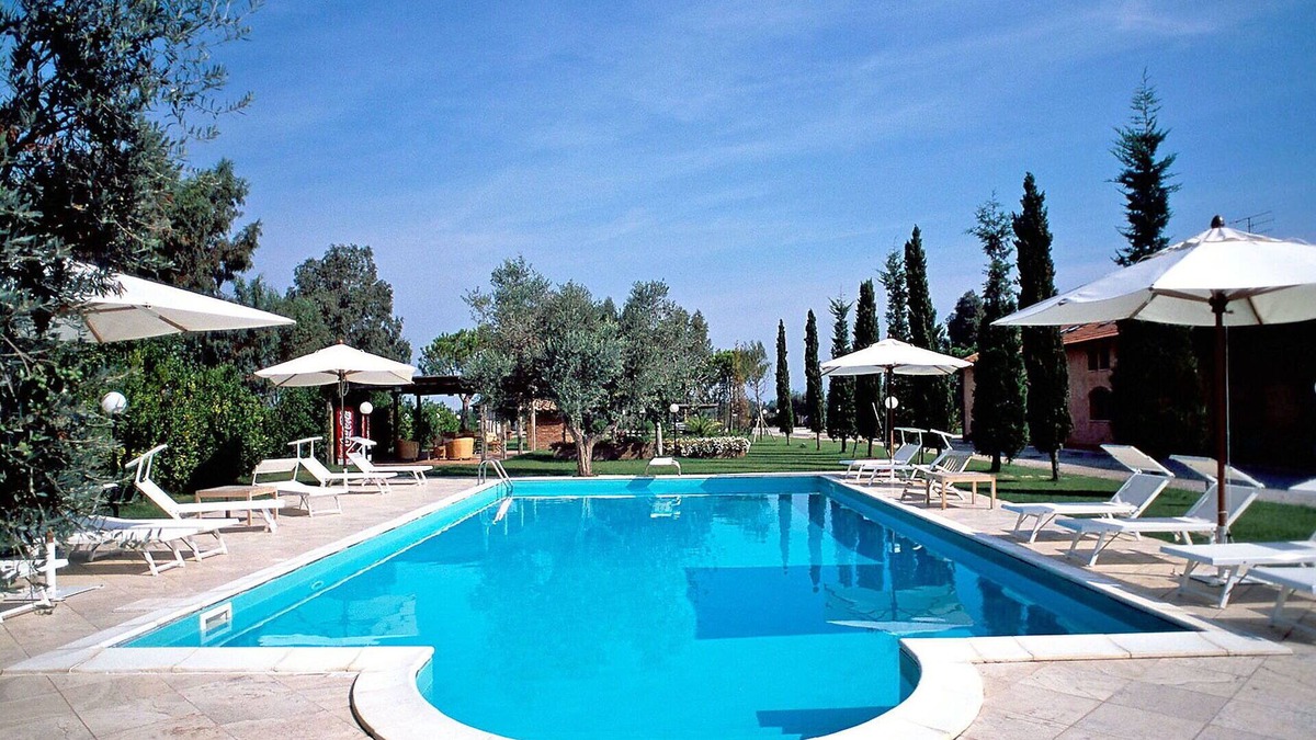 Grosseto Apartment | Lovely apartment for 4 guests with pool, WIFI, A/C, TV, patio, pets allowed and parking