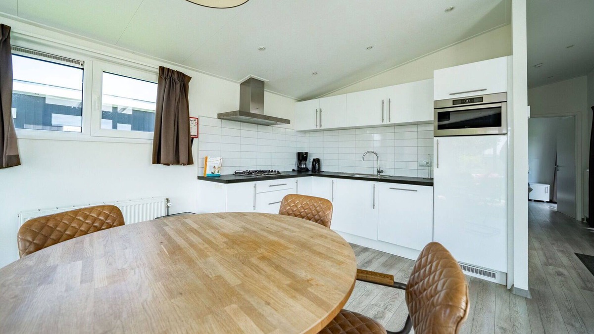 Susteren House | Lovely apartment in villa for 4 guests with pool, WIFI, TV, terrace and parking