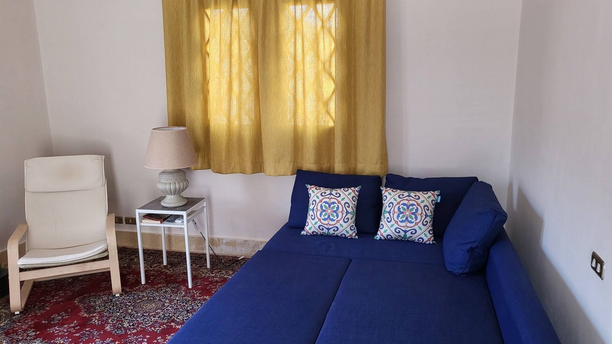 Al Rehab Apartment | Lovely one-bedroom condo with garden view