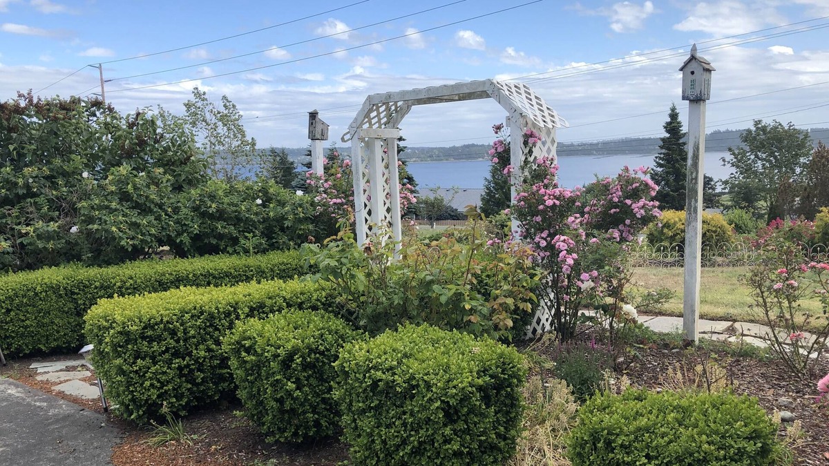 Oak Harbor Cottage | Lovely water and garden views. Two minutes drive to beaches, six to either town!