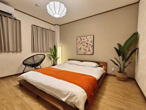 Minato House | Luna Luxury 4BR Family Villa with Parking - 2 mins from Osaka-ko Station, near EXPO, USJ, Kaiyukan