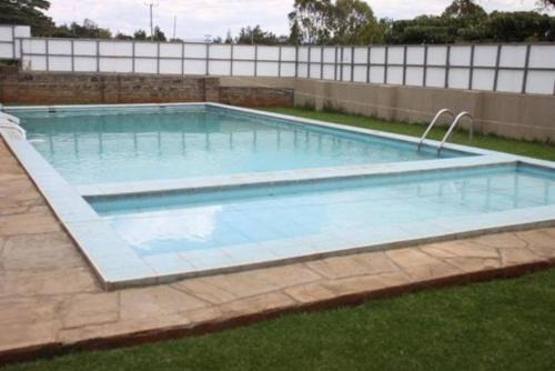 Hospital Apartment | Lux Suites Milimani Executive Apartments