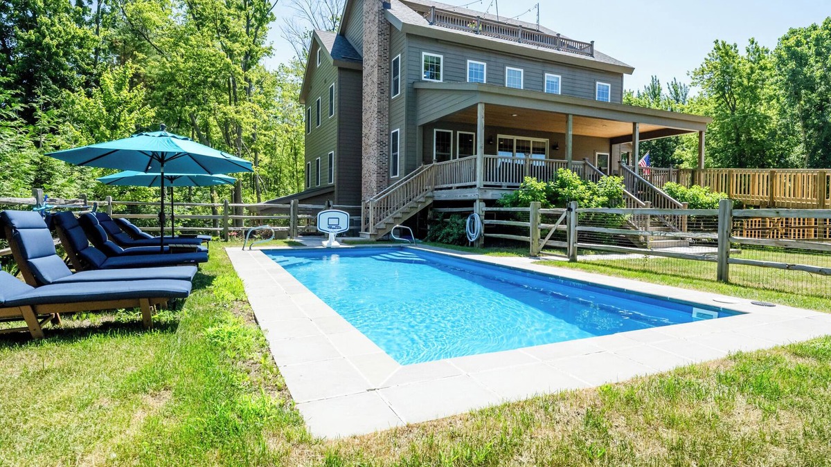 Miami Park House | Luxe family-friendly lake house-hot tub, heated pool, great golf nearby, & more!