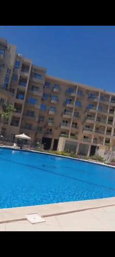 Hurghada Apartment | Luxe flat met privé strand en zwembaden