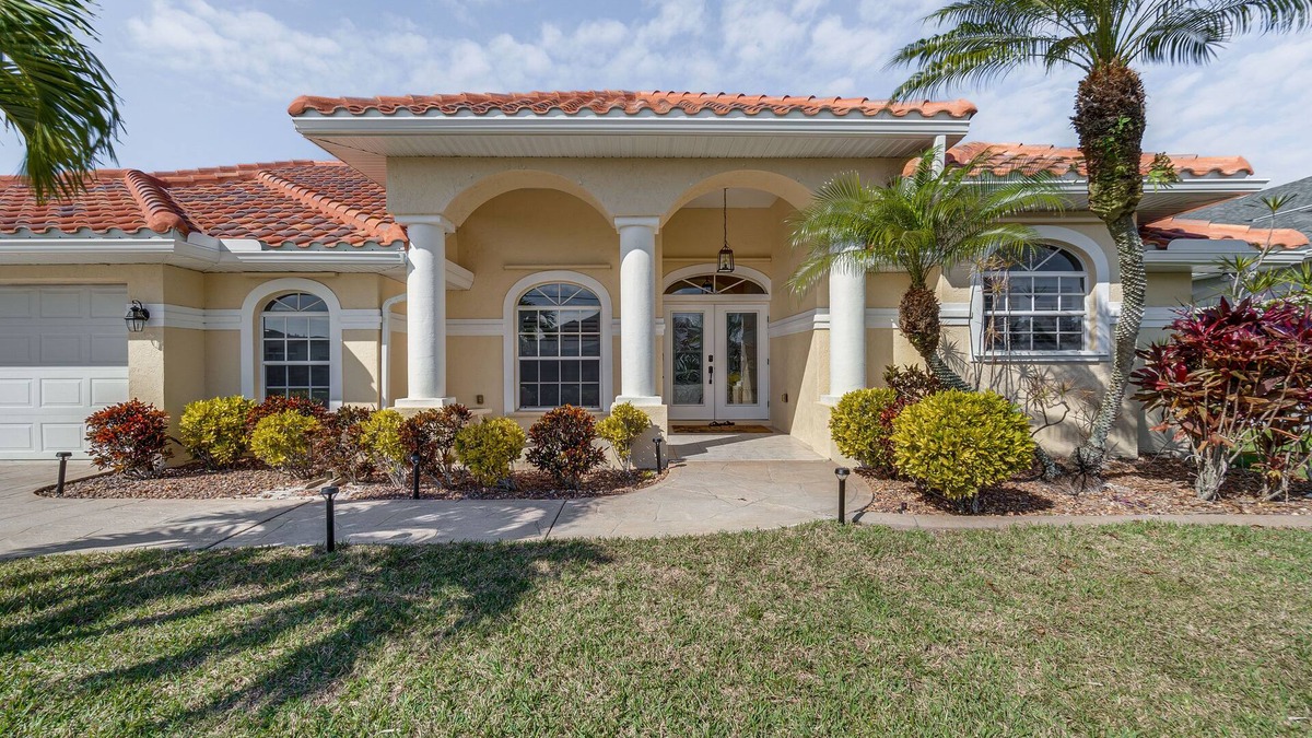 Gulf Cove House | Luxe Waterfront Oasis w/Dock, Heated Pool & Spa!