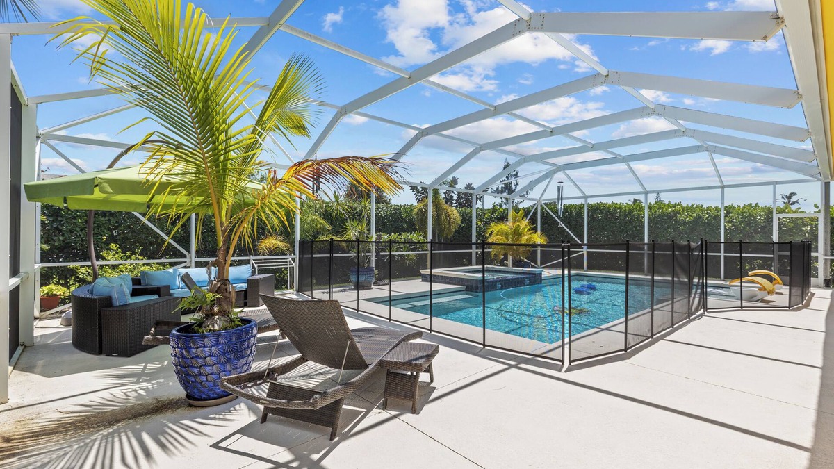 Fort Pierce House | Luxurious 4-Bedroom Pool Home -Walk to Beach & Restaurants