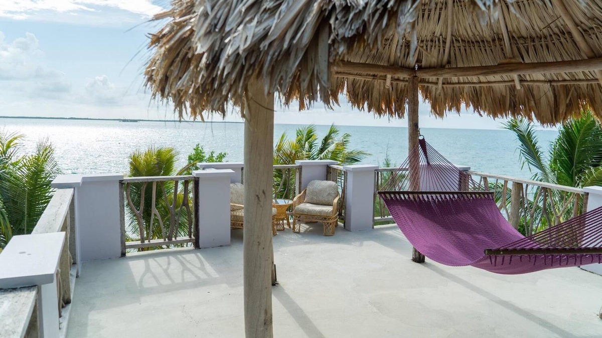 Thatch Caye Resort | Luxurious Air-Conditioned Cabana w/Rooftop Patio & Amazing Caribbean Sea Views