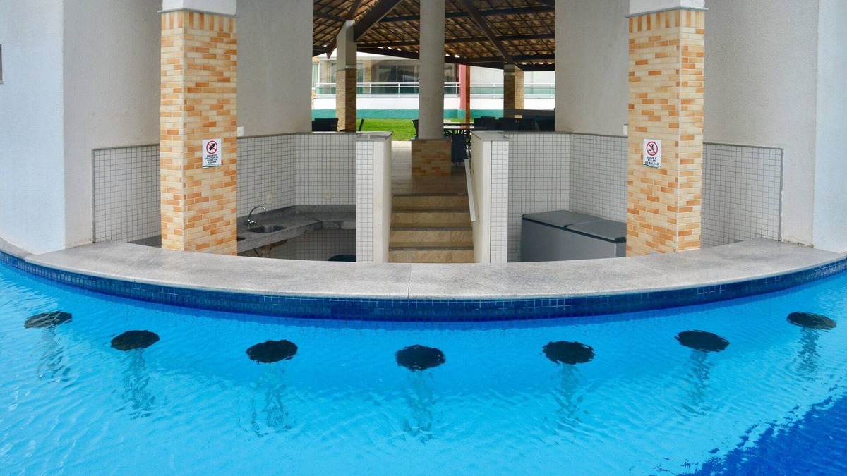 Porto das Dunas Condo | Luxurious penthouse with 2 suites, living room, balcony, jacuzzi and barbecue