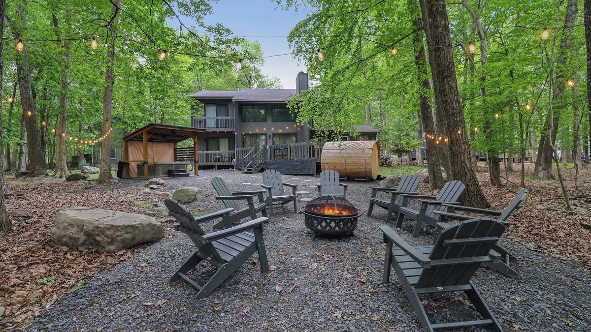 East Stroudsburg House | Luxurious Poconos Retreat~Hot Tub, Sauna, Games, Fire Pit, Pets Welcome!