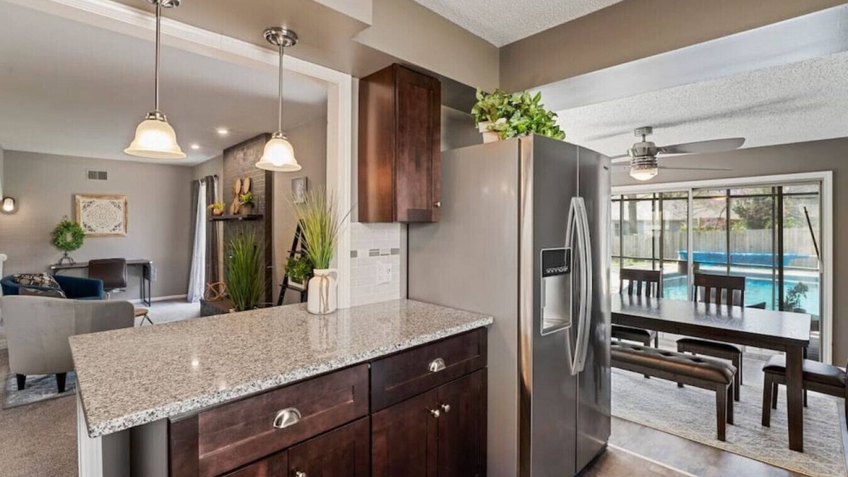 South Kansas City House | Luxurious Poolside Escape on 106th Street: Your Private Oasis in Kansas City