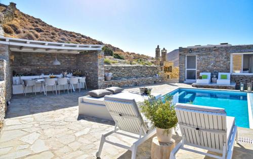 Korissia Villa | Luxurious & Stylish villa with a swimming pool, sea and sunset view.