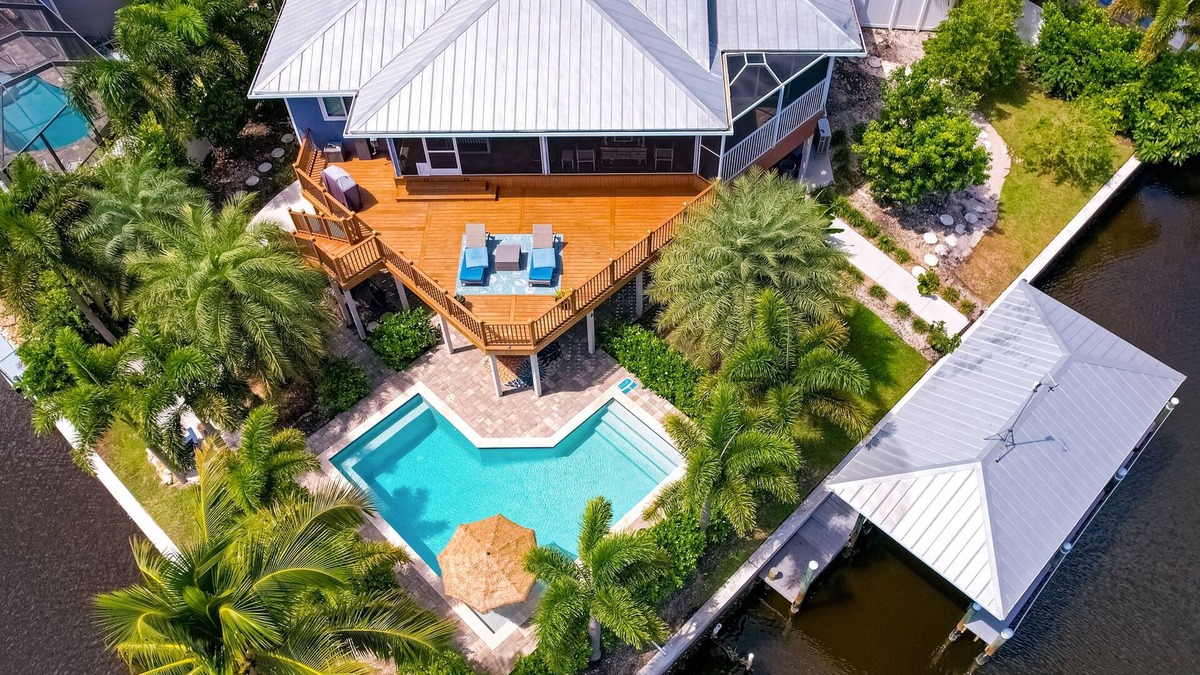Saint James City House | Luxurious waterfront home, pool, boat dock, fillet station, private guest suite