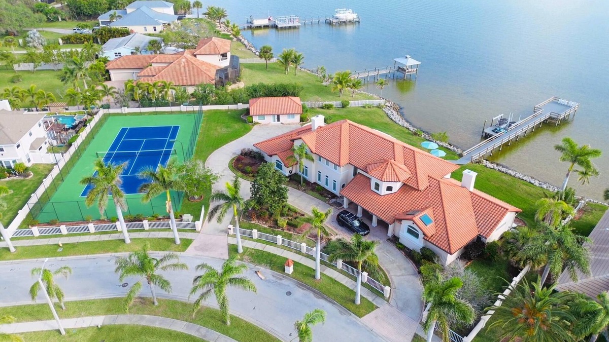 Port Canaveral House | Luxurious Waterfront Estate w/private Tennis Court/Pool/Dock - Spectacular View!