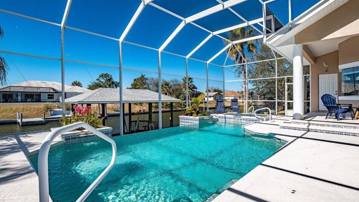 Palm Harbor House | Luxury 4-Bedroom Canal Home with Pool