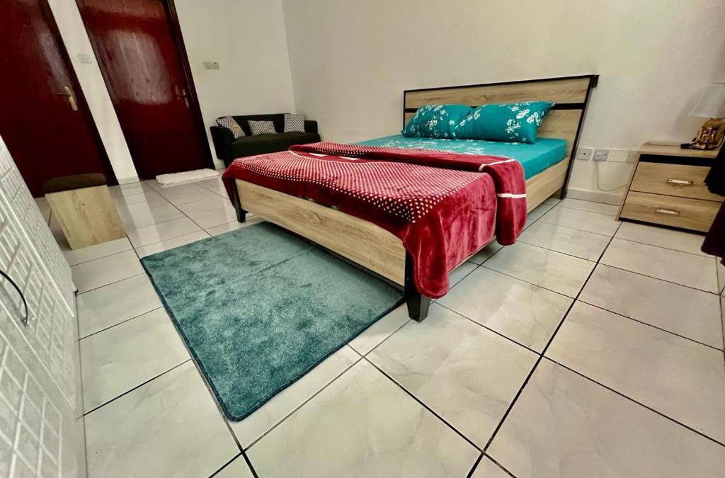 Al Majaz House | Luxury Awaits: Master Bedroom for Rent! Indulge in comfort and style.