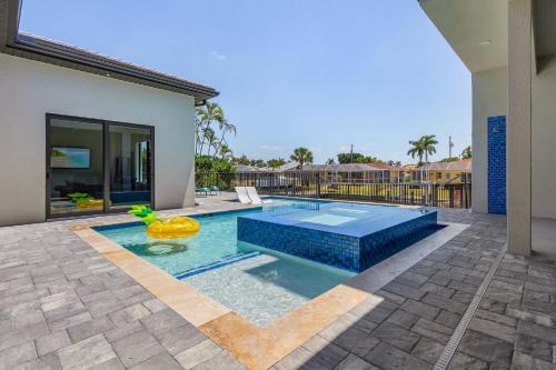 Yacht Club House | LUXURY - Close to Beach! - Pool Table, Heated Pool & Spa - Serenity Oasis - Roelens